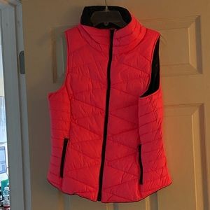 Pink and black vest